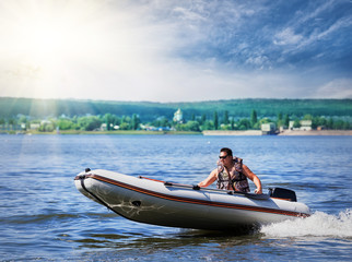 Inflatable white motor boat