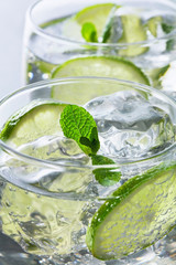 close-up view of two glasses of lime coctail