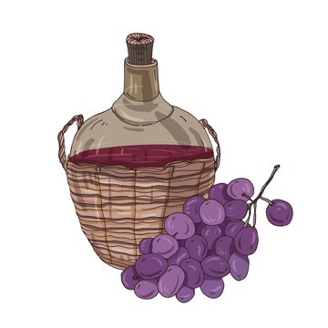 National Georgian red wine in bottle in straw basket and bunch of grapes