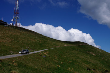 Car driving on the road hanging in the sky