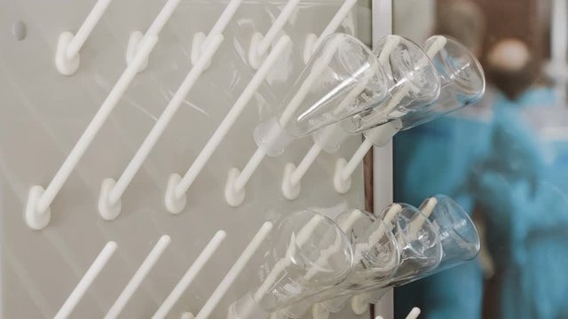 Close-up shot of empty glass flasks in the laboratory. 4K