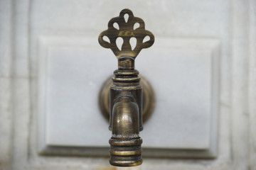 old faucet close up