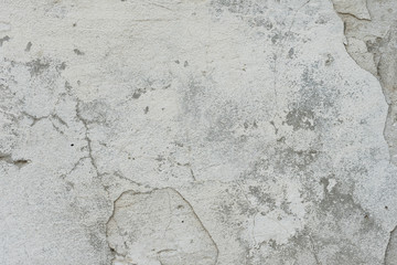 Wall fragment with scratches and cracks. It can be used as a background