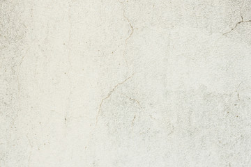 Obraz premium Wall fragment with scratches and cracks. It can be used as a background