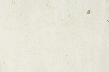 Fototapeta premium Wall fragment with scratches and cracks. It can be used as a background