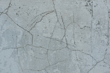 Obraz premium Wall fragment with scratches and cracks. It can be used as a background