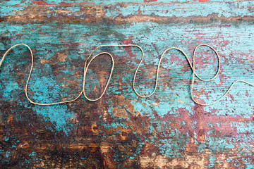 word Love made of rope on a blue background