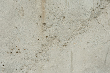 Fototapeta premium Wall fragment with scratches and cracks. It can be used as a background