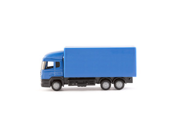 Blue truck miniature on white background  © Jakub Krechowicz