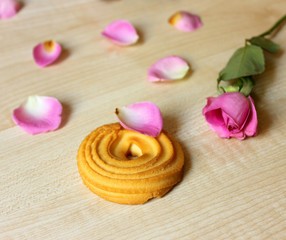 Cookies and pink rose