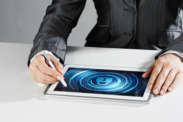 Internet security concept with woman working on media screen with stylus