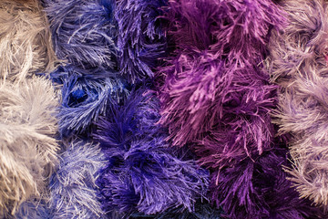 Colored balls of yarn. Knitting needles. Crocheting yarn