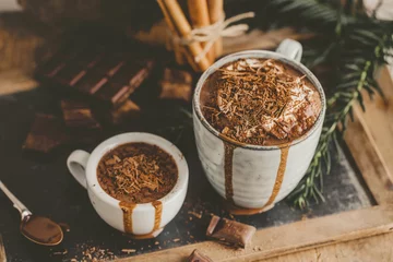 Fotobehang Tasty hot chocolate drink in mugs © nerudol