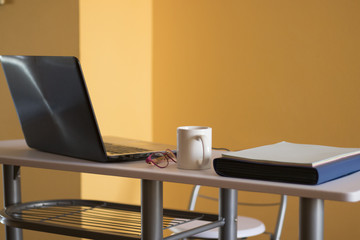 Computer, laptop with blank screen in office