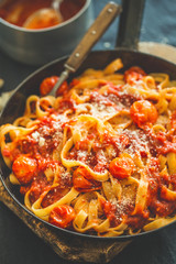 Tomato sauce spaghetti pasta on pan
