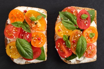 Sandwiches with cheese and tomatoes.