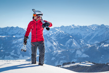 Male freeride skier in the mountains