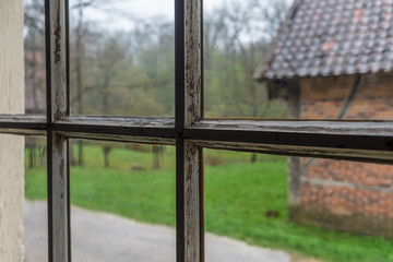 The window of an old farmhouse, inside