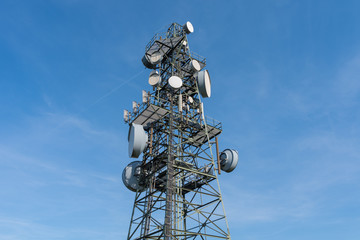 Transmission tower on the  Koeterberg mount  against sky,  Germany