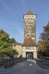 Fototapeta na wymiar Roeder gate at the town wall gives entrance to Rothenburg ob der Tauber