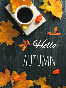Fototapeta Hello autumn composition with coffee, book and bright colorful leaves