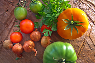 Fresh Autumn Vegetables. Tomatoes, onion and parsley.