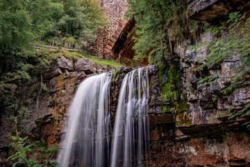 waterfall under bridge