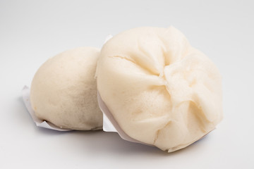 Steamed stuff bun on white background