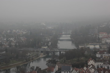 Germany view on city from top red roofs in fog