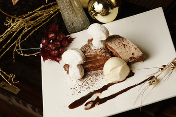 Chocolate cake with vanilla ice cream and polvoron cookie.