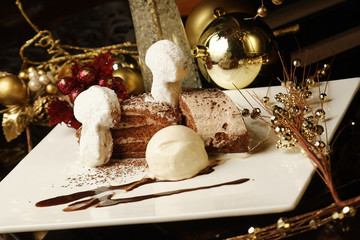 Chocolate cake with vanilla ice cream and polvoron cookie.