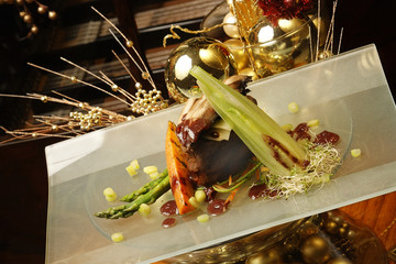 Fillet mignon with portobello mushrooms served with asparagus, carrot and soy.