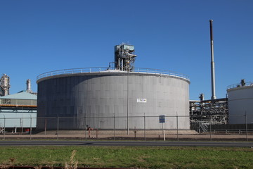 Tanks and pipes in the chemical industries in the Botlek Harbor in Rotterdam.