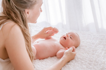 Baby and mother playing