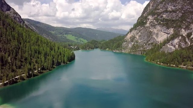 Aerial view of the crystal clear lake Lago di Braies, Italy 
