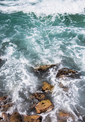 waves crashing on rocks