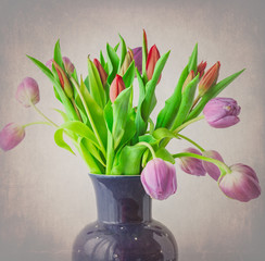 Fototapeta na wymiar Tulips in a blue Vase
