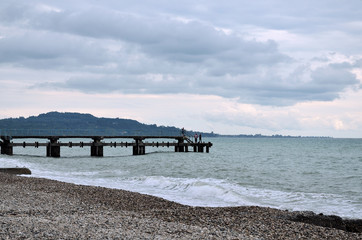 View of the Black sea and the beach in cloudy weather.