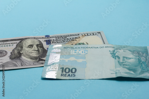 Banknotes Of Brazilian Currency Real And North American Banknotes Of Brazilian Currency Real And North American Us Dollars Bills On