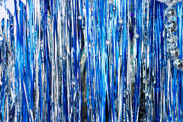 colorful shiny streamers background, blue and silver serpentine decoration, serpentine shiny...