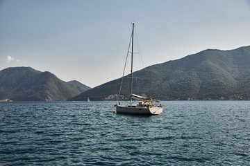 A lonely yacht in the Bay of Kotor. Montenegro. 