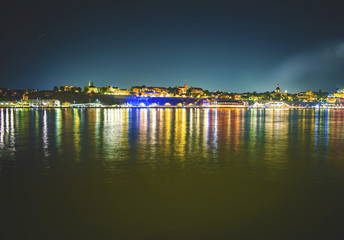 Fototapeta premium Stockholm skyline at night from the harbor Stockholm canal at down with dramatic sky 