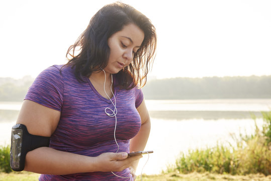Female athlete using a mobile phone