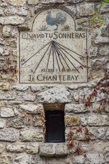 View of old sundial in a street of Montmartre,  Paris, France