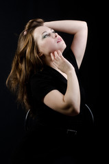 Naklejka premium beautiful girl in the Studio