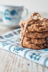 Chocolate cookie with cup of tea