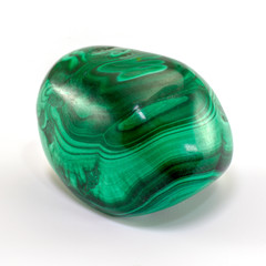 Polished beautiful malachite stone isolated on white background