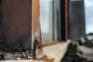 Old warehouse with rusty construction elements.