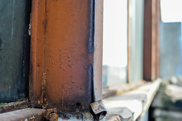 Old warehouse with rusty construction elements.