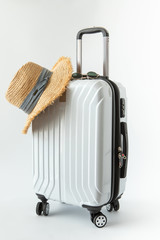 white baggage luggage carry on plane hat travel journey to destination long weekend holiday on white background